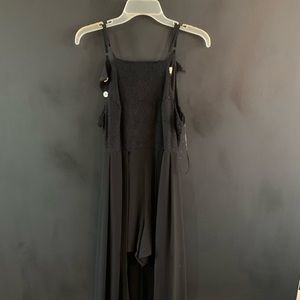 Medium high low romper. Never worn! Smoke free home
